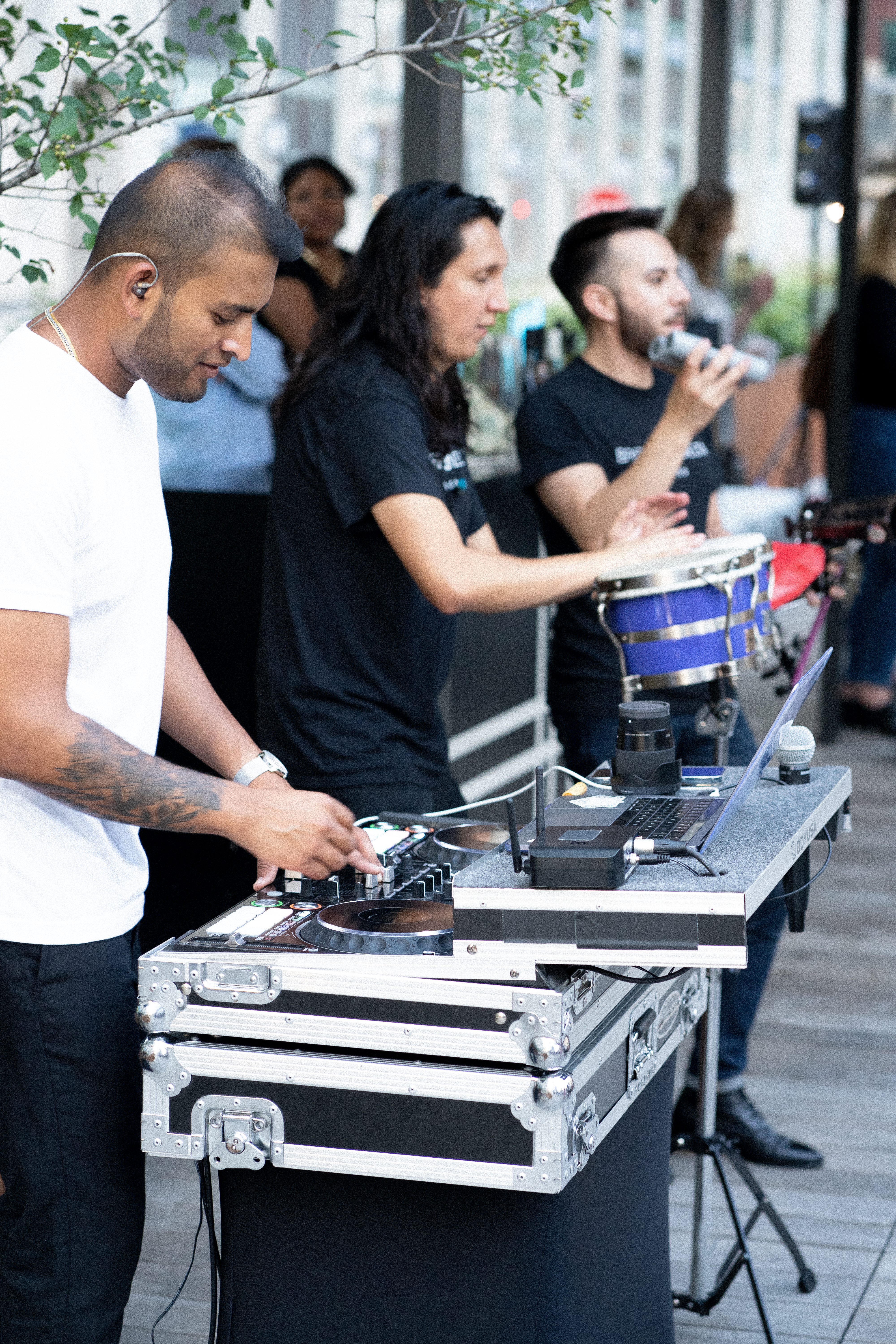 DJ Ankit performing live at a corporate event in Chicago, creating an engaging atmosphere with professional DJ equipment.